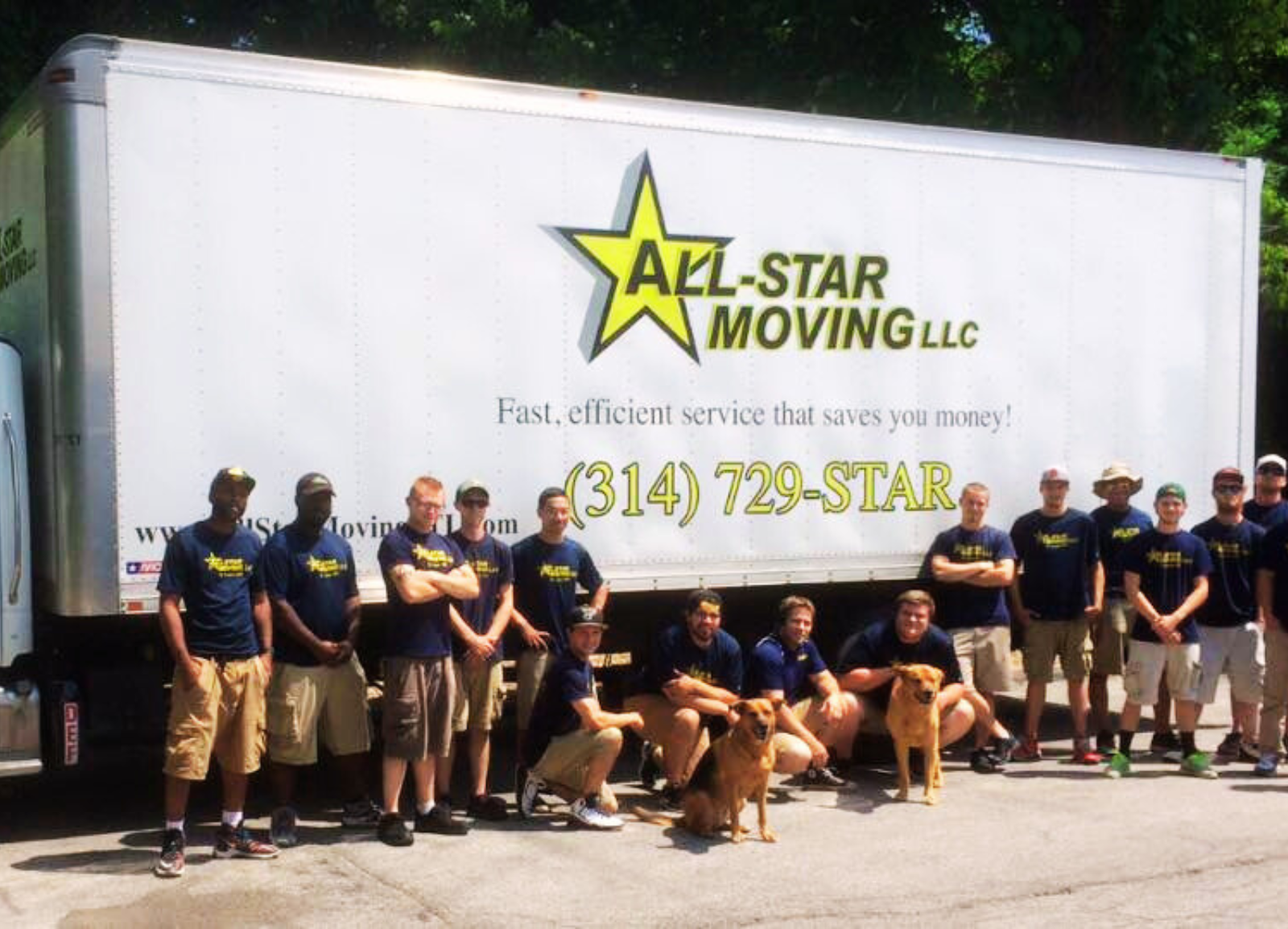 All-Star Moving employees pose next to one of their trucks